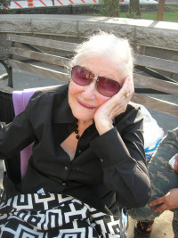 Women With Sunglasses And Black Blouse